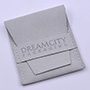 Pochette portagioielli personalizzata, busta in pelle microfibra con fascia e logo inciso