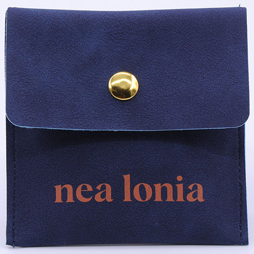 Sac à bijoux en cuir personnalisé avec bouton pression et logo