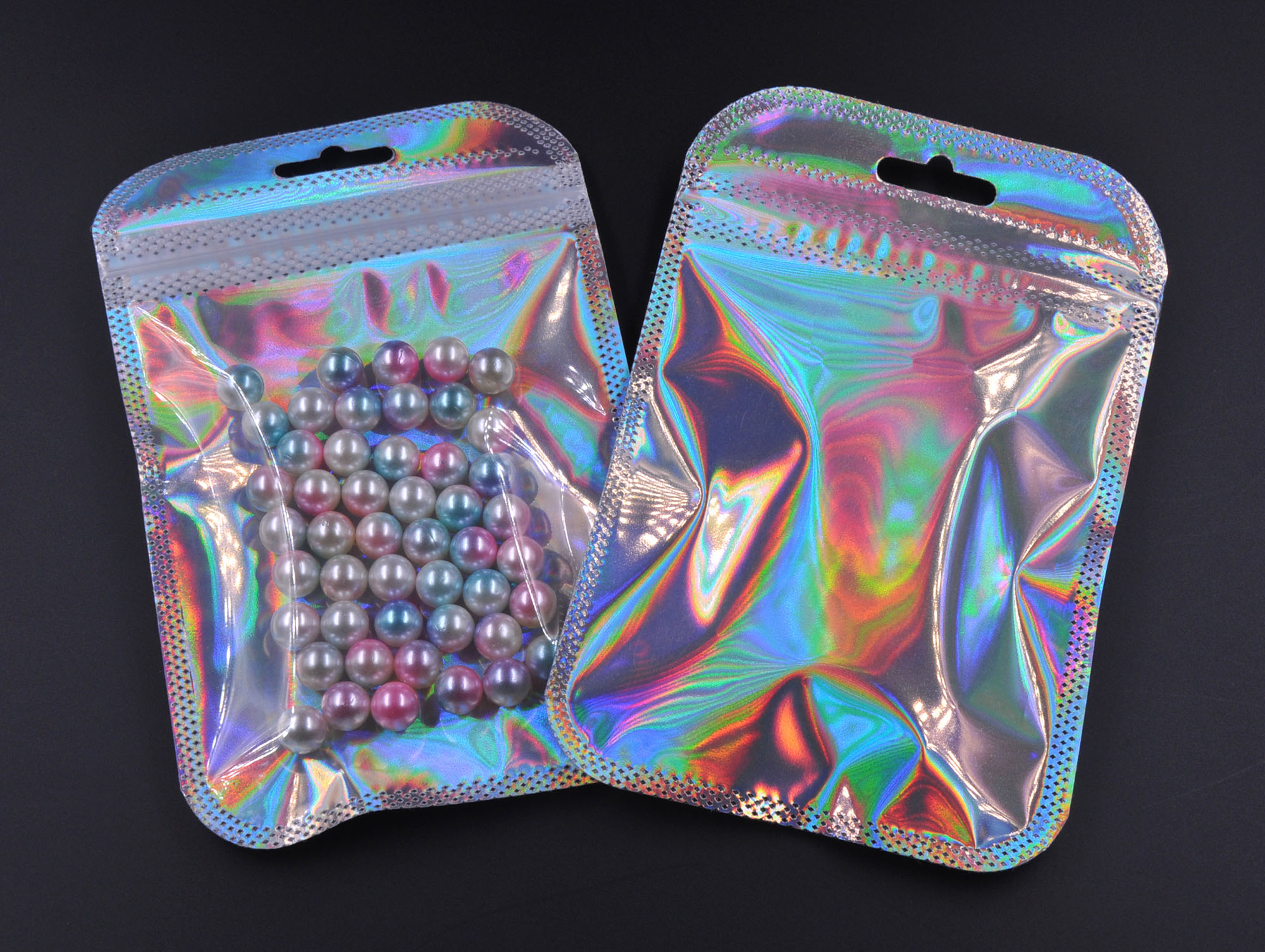Pochette à bijoux en plastique holographique avec fermeture zippée et feuille d'aluminium