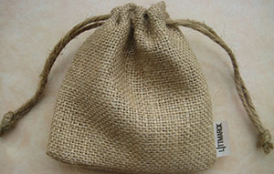 Natural jute drawstring bag with jute cord drawstring. Size: 12cm x 12cm