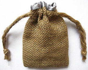 Jute drawstring bag with satin lining, without custom label.