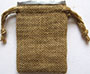 Jute drawstring bag with satin lining, without custom label.