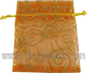 Bolsas decorativas de organza naranja con estrellas y remolinos dorado