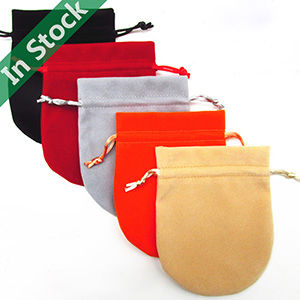 Vente en gros de sacs en velours pochettes à bijoux à cordon avec fond rond en stock
